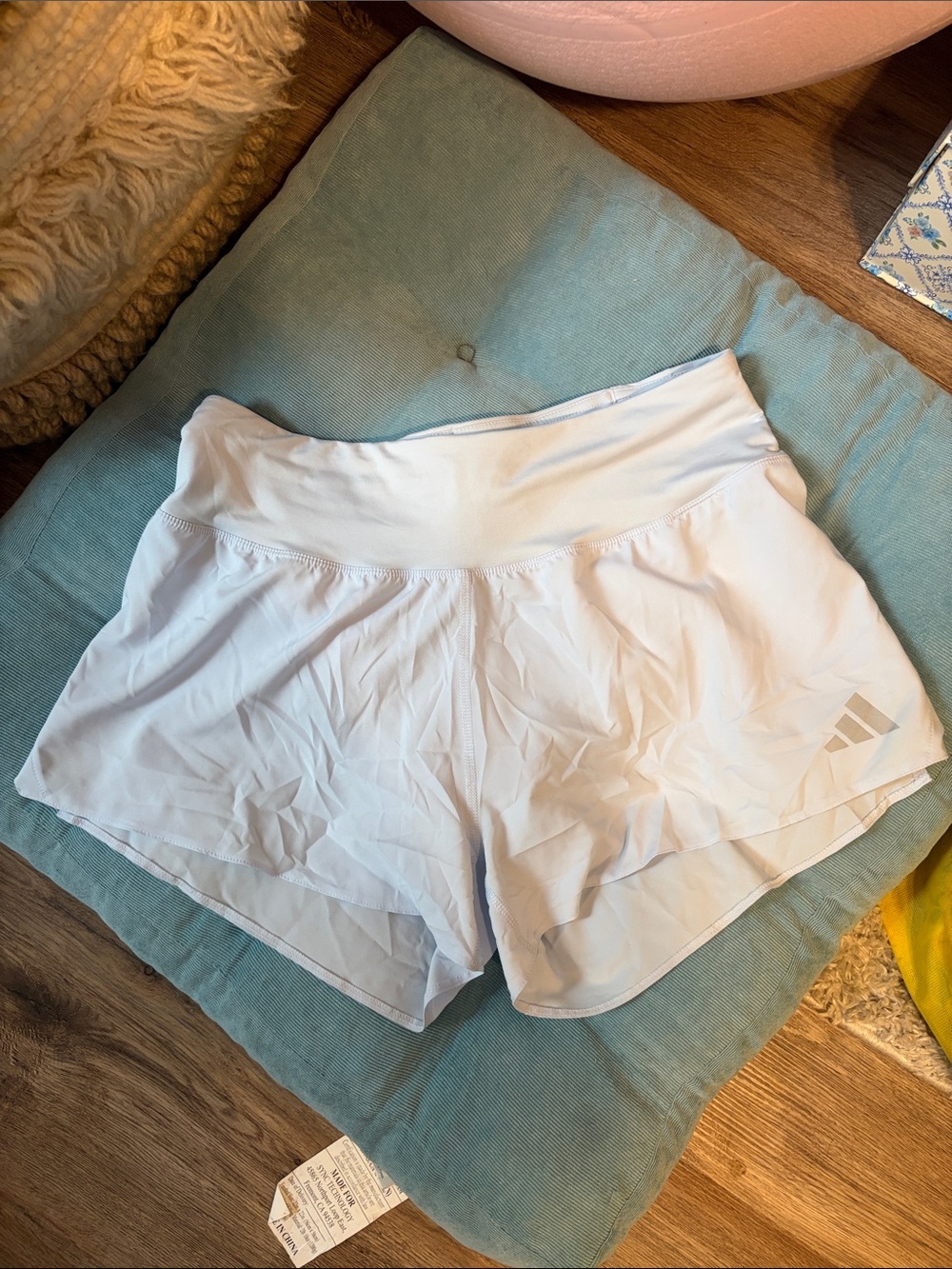 Adidas Women's Light Blue Athletic Shorts with Subtle Logo and built in liner